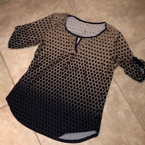 Stretchy poly-spandex pullover, 3/4-length sleeves w/decorative button straps.